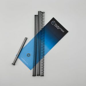 Curated Arms guide rod kit installed in a Sig P365 with three flat wire springs and a guide rod collar, shown in stainless finish.